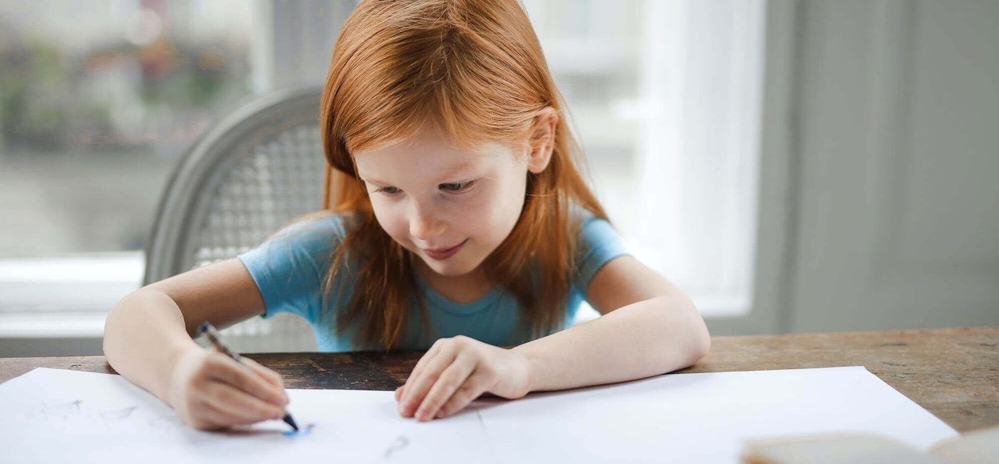 Two children on tablet and laptop